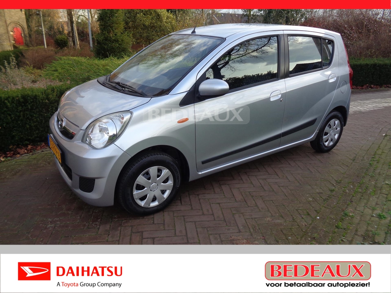 Daihatsu Cuore - 1.0 51KW 5D Premium Airco bij Daihatsu dealer met 12 maanden Bovag garantie. - AutoWereld.nl