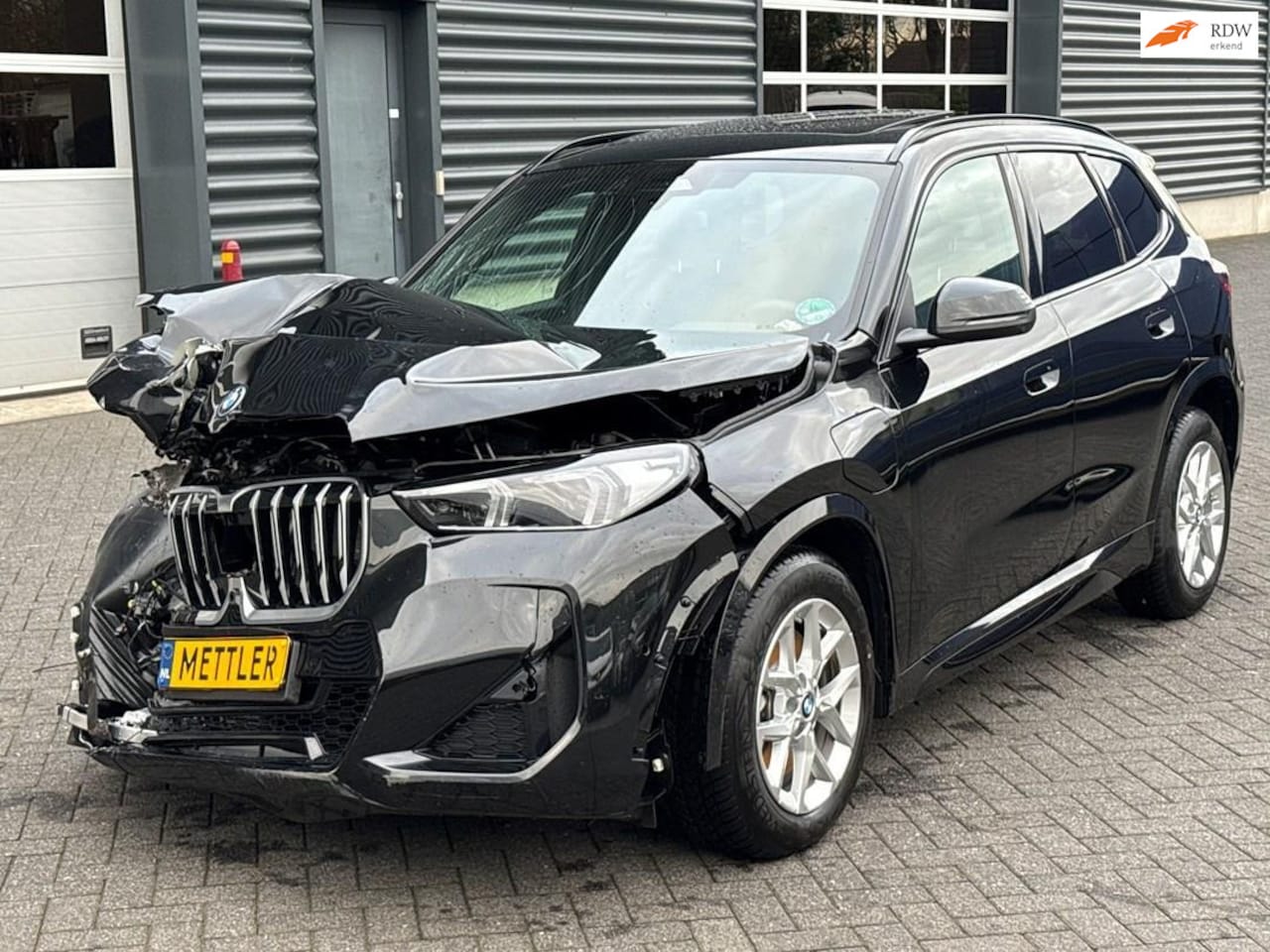 BMW X1 - XDrive30e, harman kardon, 360 camera, panoramadak, trekhaak - AutoWereld.nl
