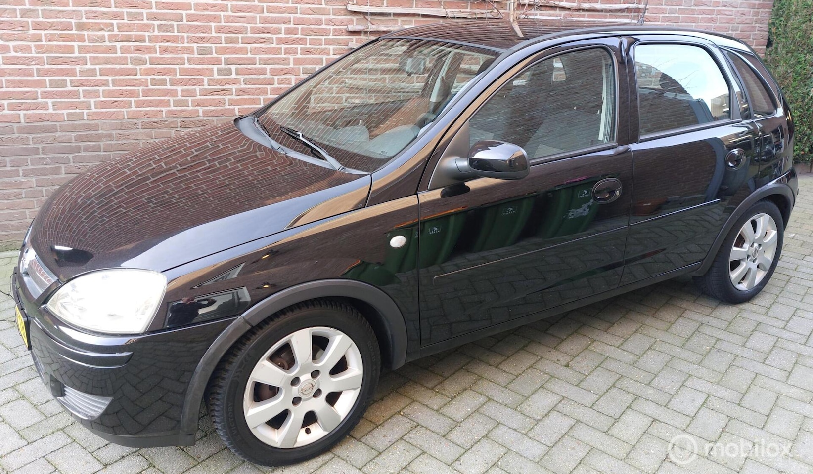 Opel Corsa - 1.2-16V Full Rhythm 1.2-16V Full Rhythm (Navi/Airco/Cruise/lage kms) - AutoWereld.nl