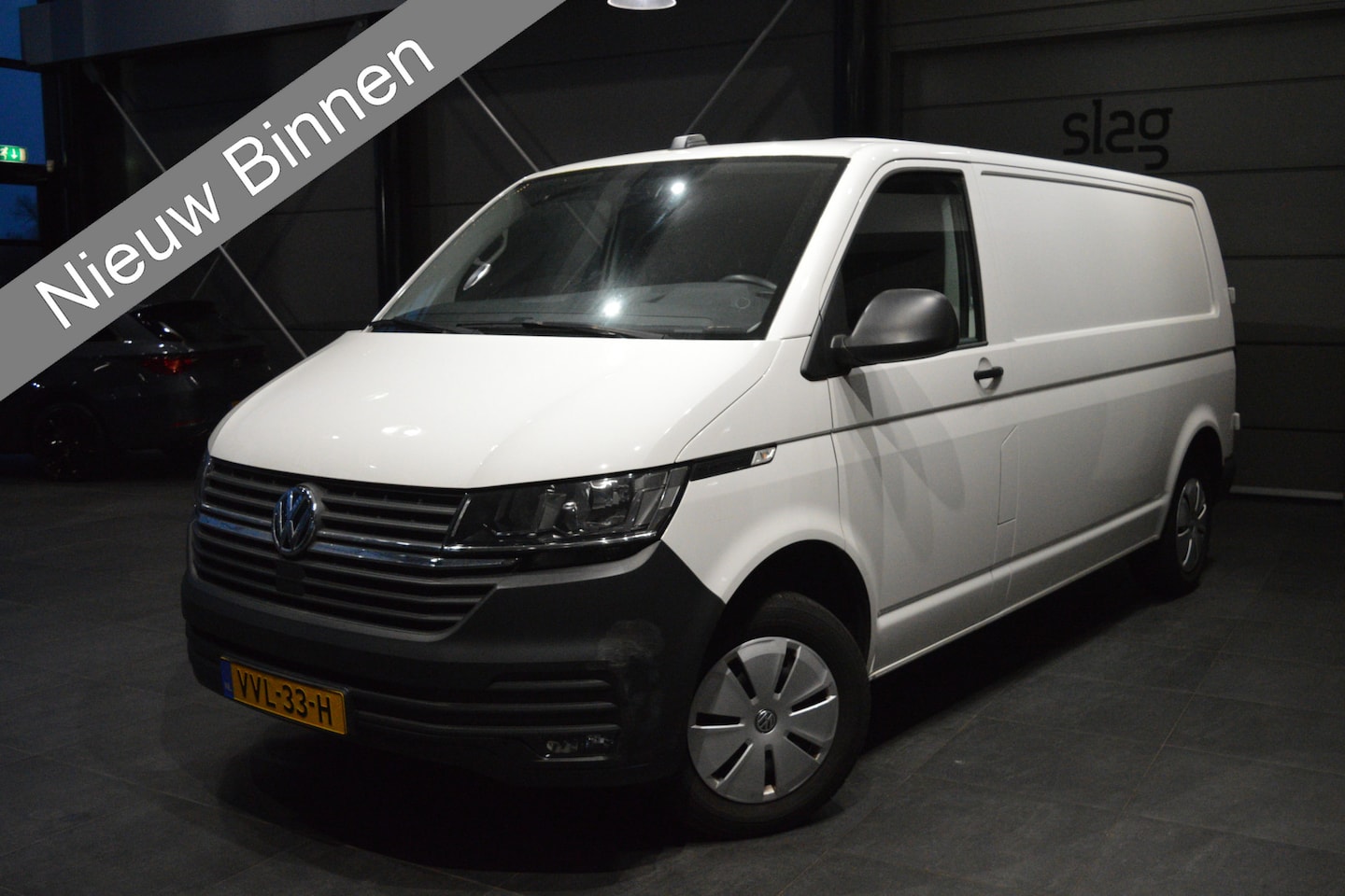 Volkswagen Transporter - 2.0 TDI L2H1 navi airco cruise pdc trekhaak 110 pk !! - AutoWereld.nl