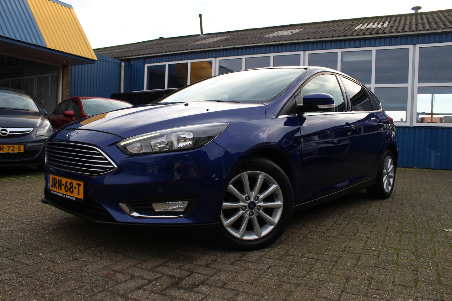 Ford Focus - 1.0i "Titanium" Cruise - Navi !!! 125 Pk - AutoWereld.nl