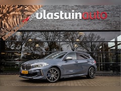 BMW 1-serie - M135i xDrive High Executive 306pk , Kuipstoelen, Harman/Kardon, Head-up display, Sfeerverl
