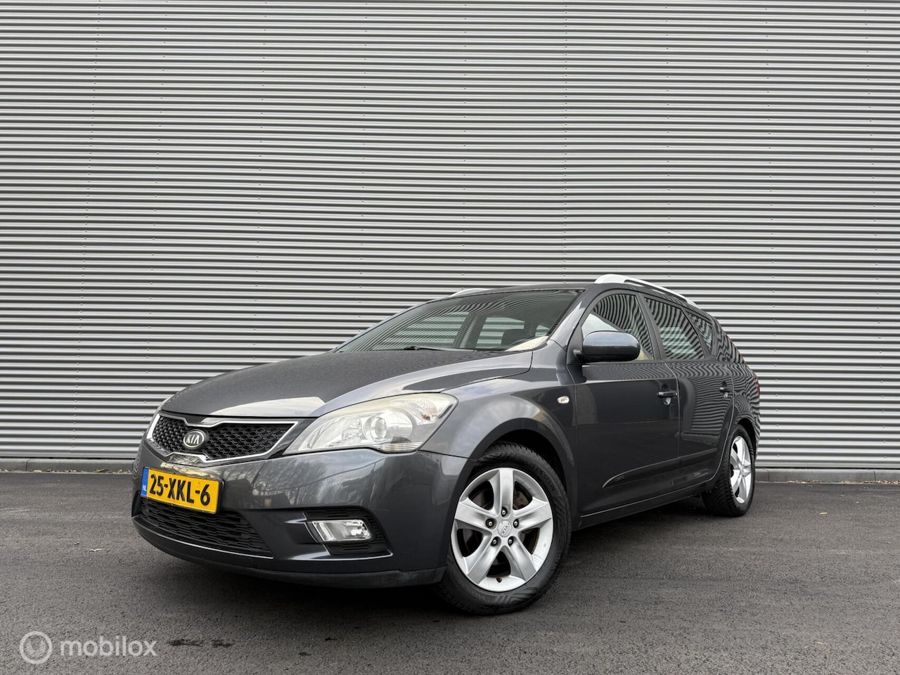 Kia Cee'd Sporty Wagon - 1.4 CVVT Navigator Plus Pack | Camera | Trekhaak | Clima | Navi | PDC | Cruise | Isofix | - AutoWereld.nl