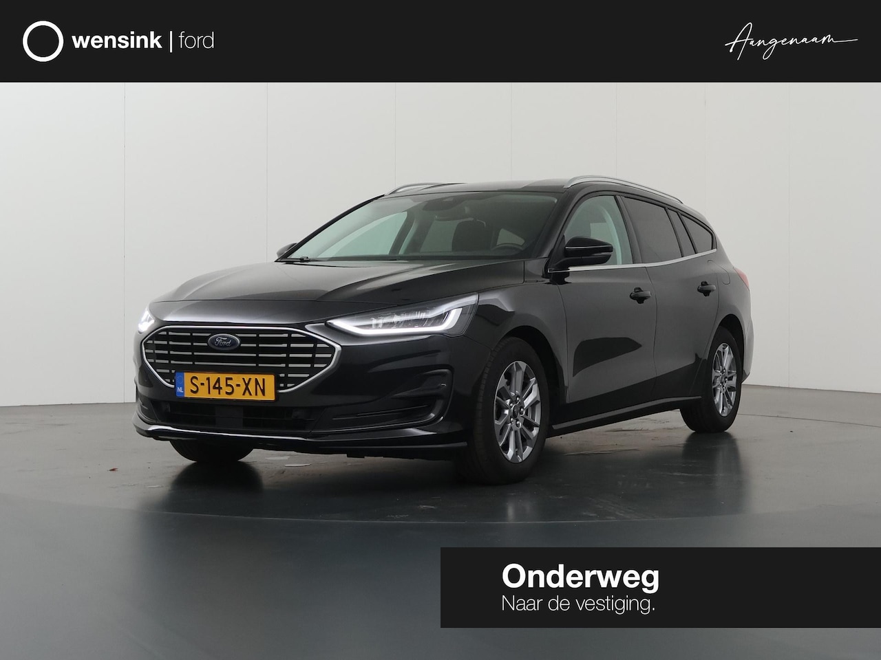 Ford Focus Wagon - 1.0 EcoBoost Hybrid Titanium | Navigatie | Climate Control | Cruise Control | Parkeersenso - AutoWereld.nl