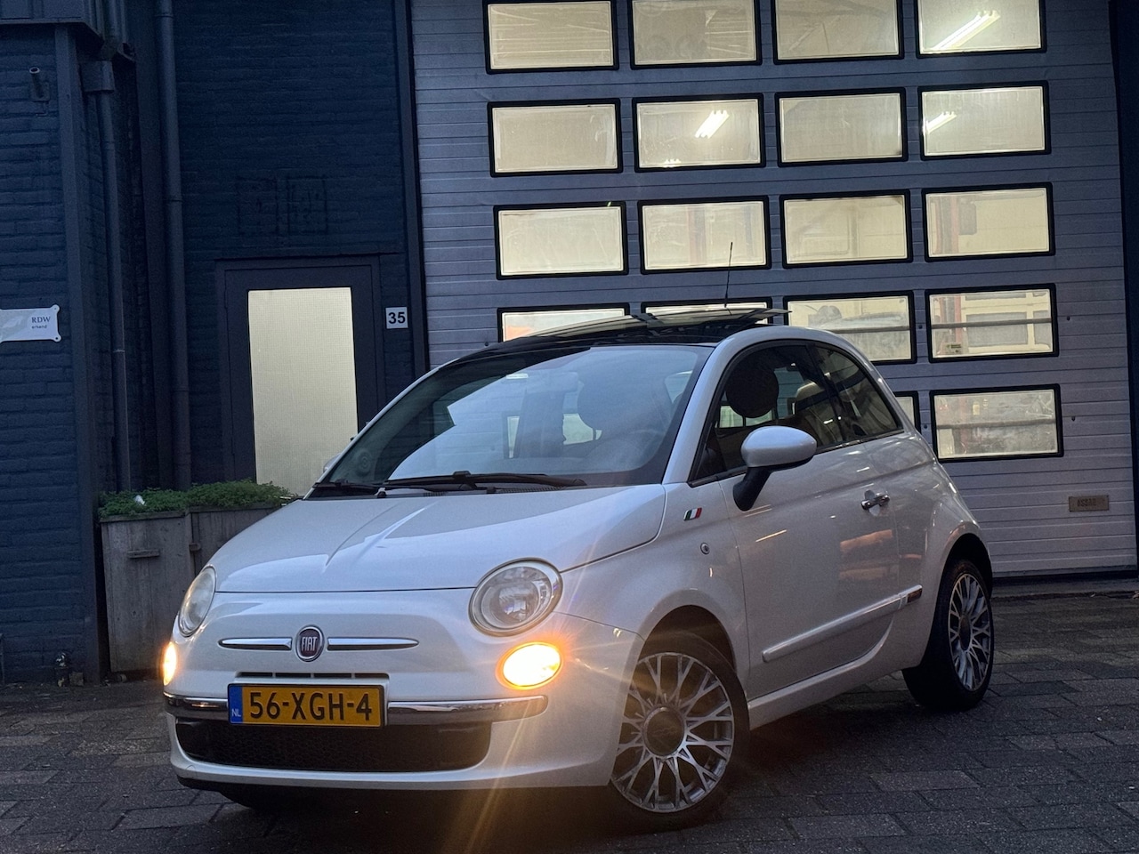 Fiat 500 - 1.2 Lounge | Airco | Navi | Camera | Schuifdak - AutoWereld.nl