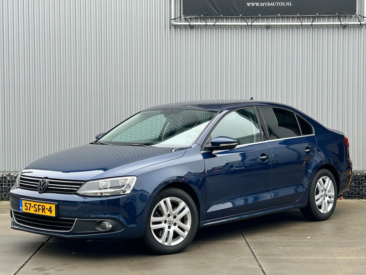 Volkswagen Jetta - 1.4 TSI Highline 1.4 TSI Highline, Automaat, Clima, Navi, Trekhaak - AutoWereld.nl