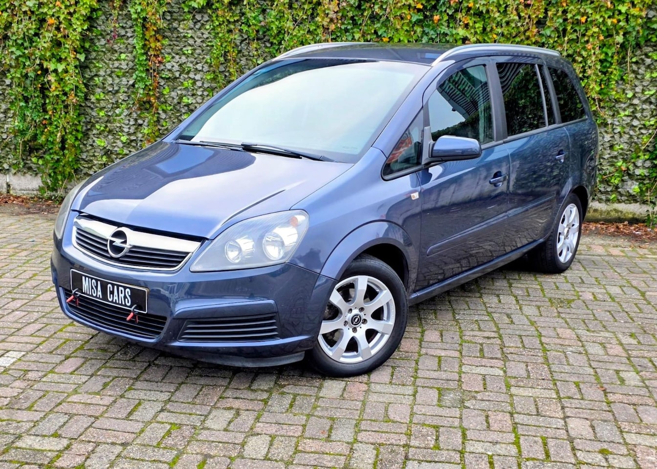 Opel Zafira - 1.6 Essentia NW APK 7 person cruise Navi controle Sport Velgen - AutoWereld.nl