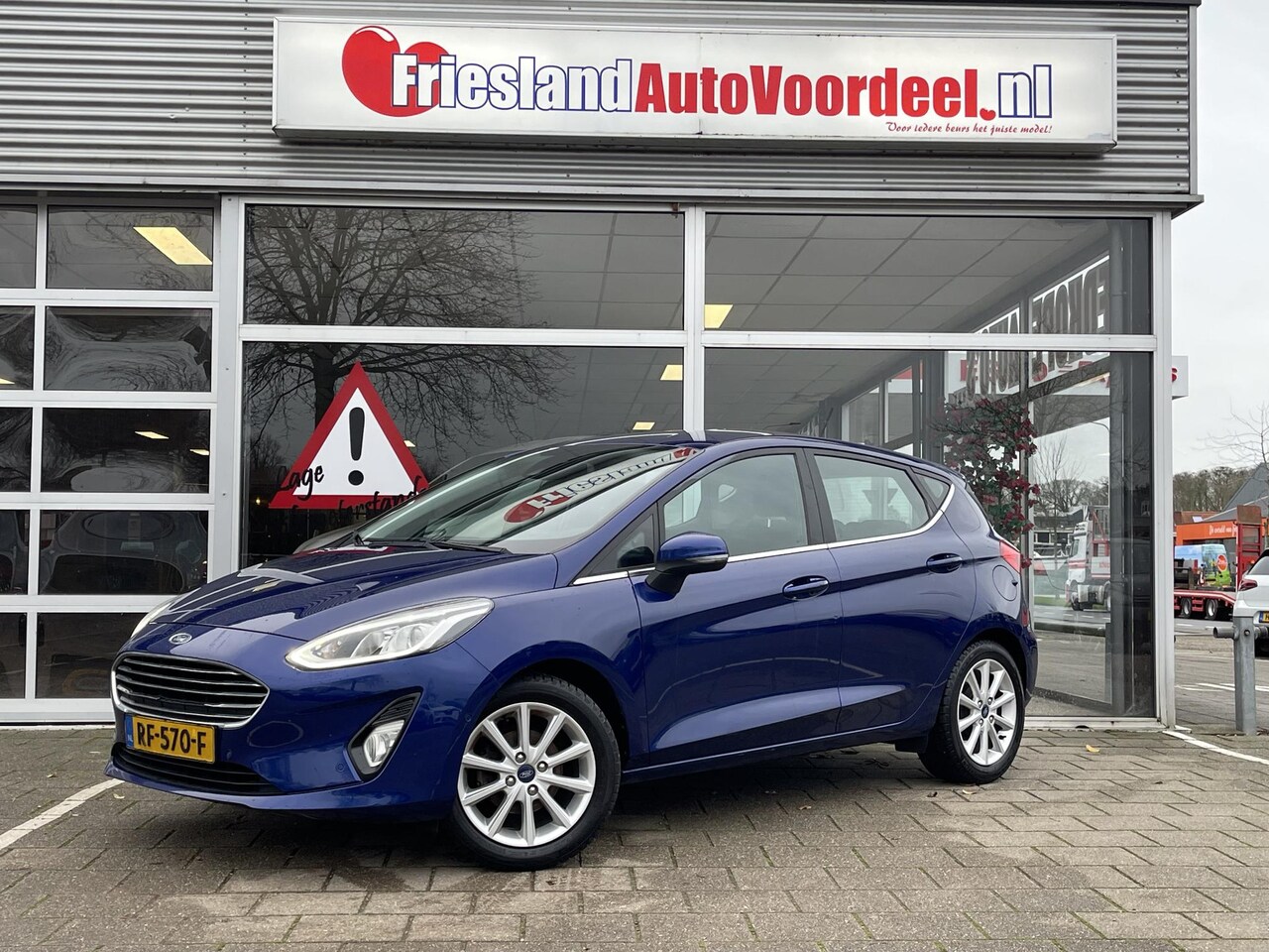 Ford Fiesta - 1.0 EcoBoost Titanium /Adaptive Cruise/Clima/Navi/Parkeer assistent/2017 - AutoWereld.nl