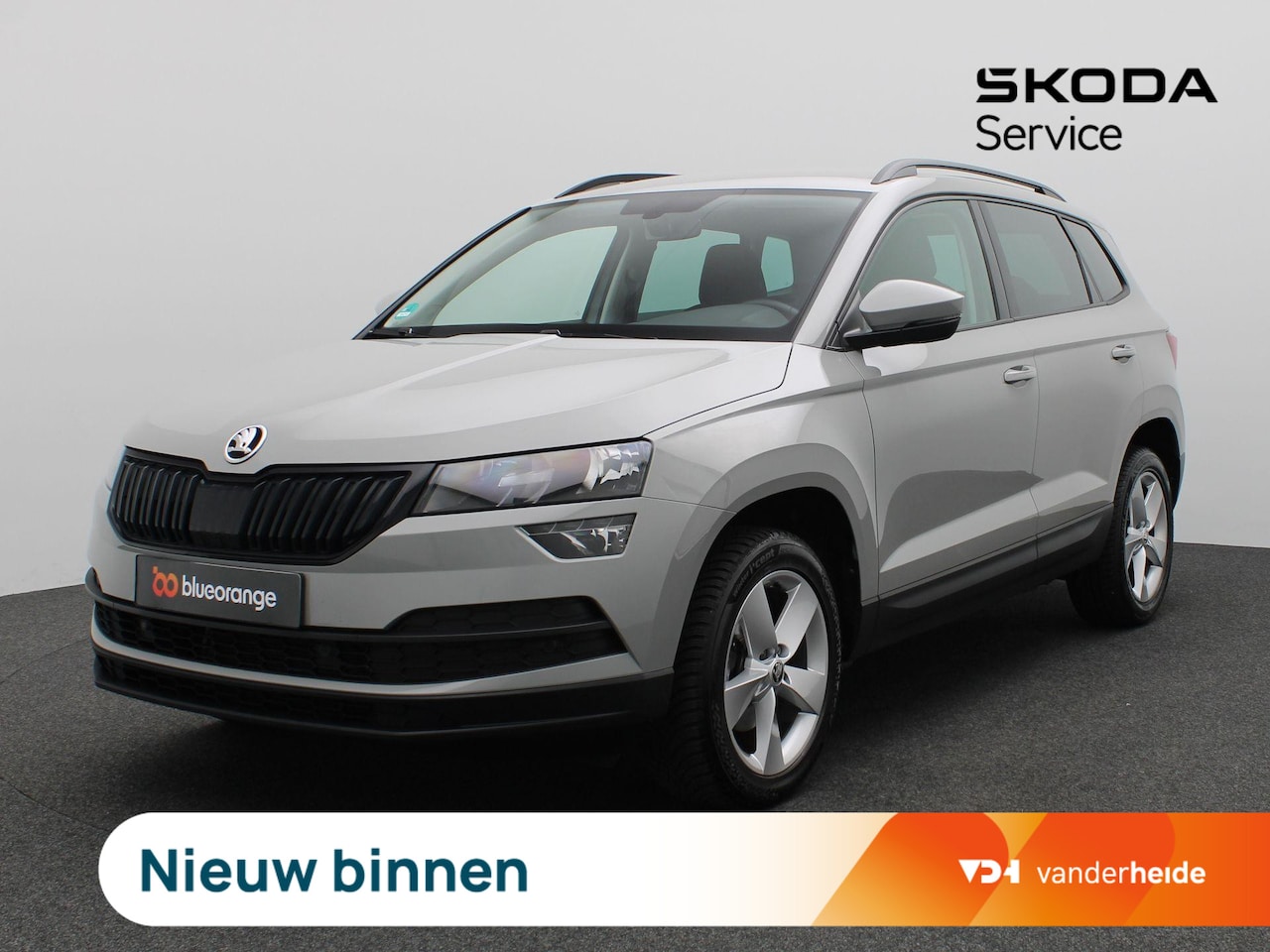 Skoda Karoq - 1.5 TSI Business Edition Plus 150PK Trekhaak, Achterruitrijcamera, Keyless, Stoelverwarmin - AutoWereld.nl