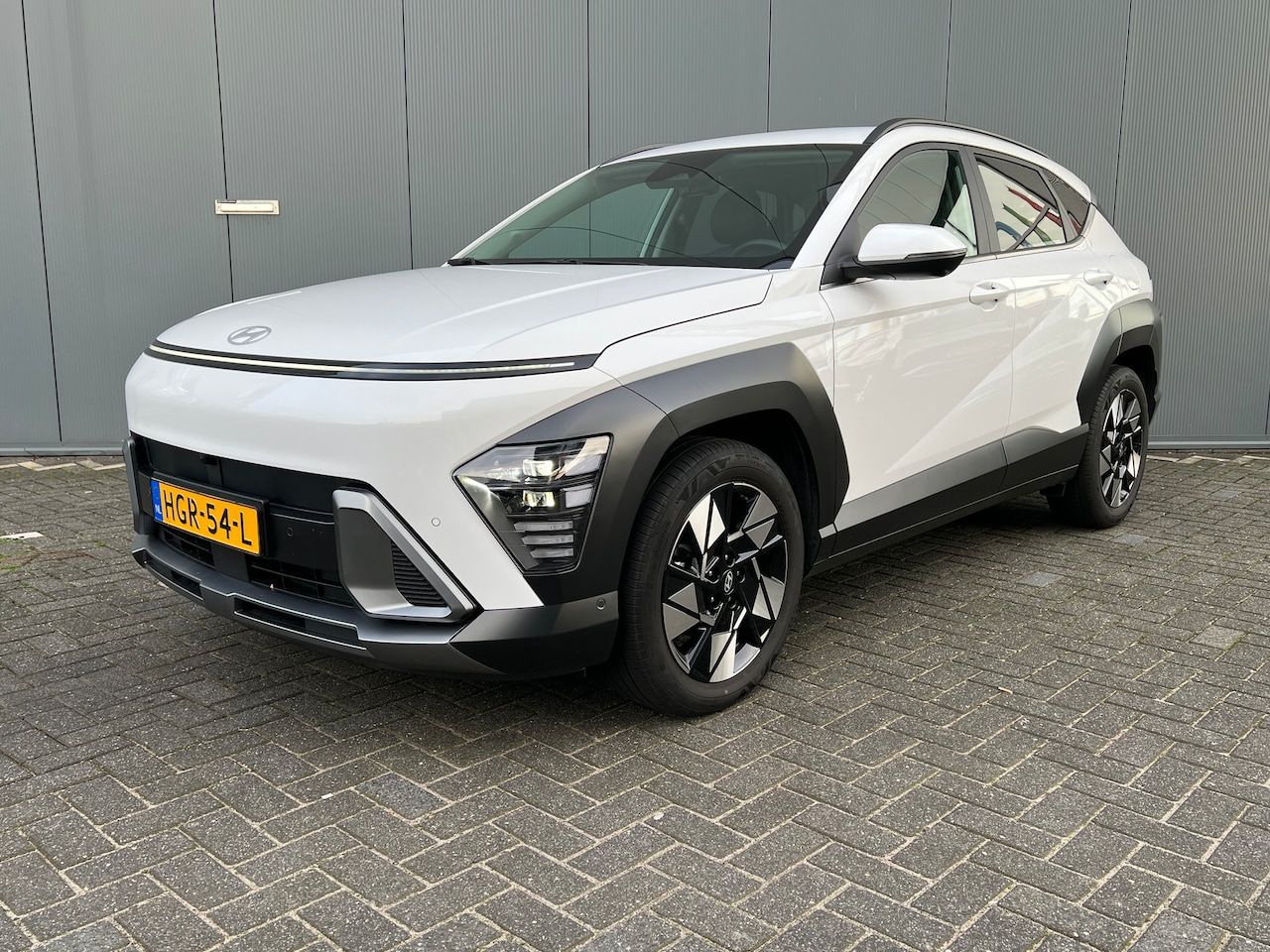 Hyundai Kona - 1.6 GDI 141pk HEV Premium | Premium audio | 360 camera | Bestuurdersstoel met geheugen | A - AutoWereld.nl
