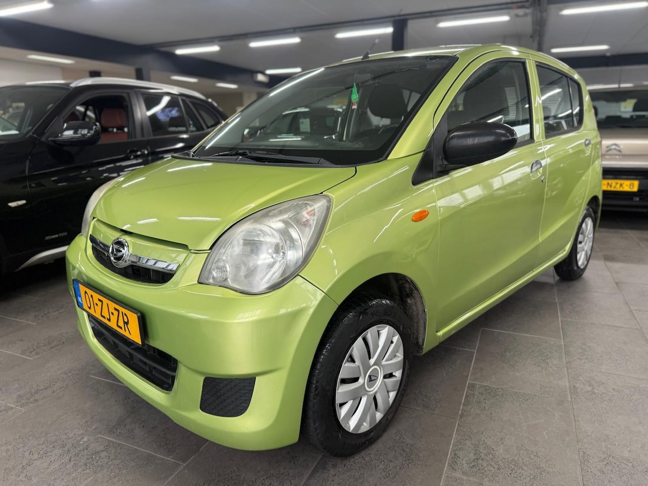 Daihatsu Cuore - 1.0 Trend 5-deurs stuurbekrachtiging zeer zuinig apk 20-12-2026 - AutoWereld.nl