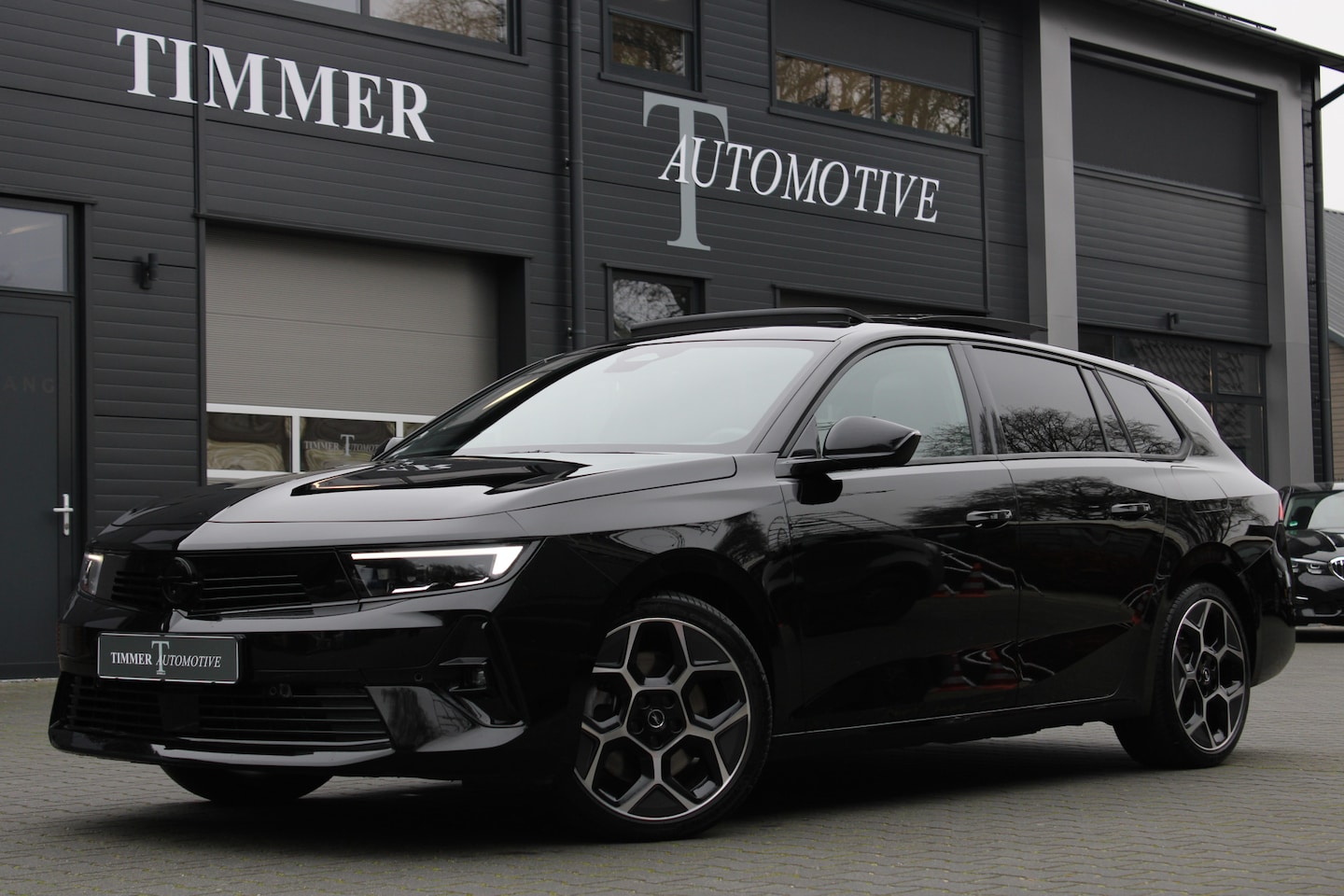 Opel Astra Sports Tourer - 1.6 Turbo Plug In Hybrid Ultimate Edition Leder - Panoramadak - Adaptieve cruise control H - AutoWereld.nl