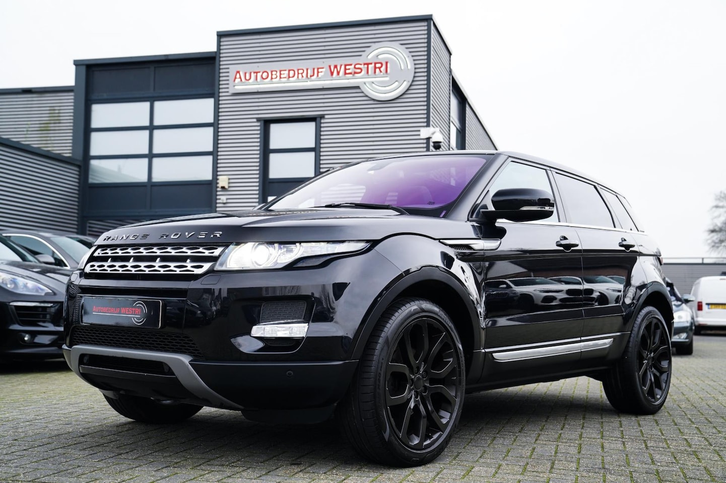Land Rover Range Rover Evoque - 2.0 Si 4WD Prestige | Panorama | Meridian | Luxe Leder | Camera | Trekhaak | NAP - AutoWereld.nl