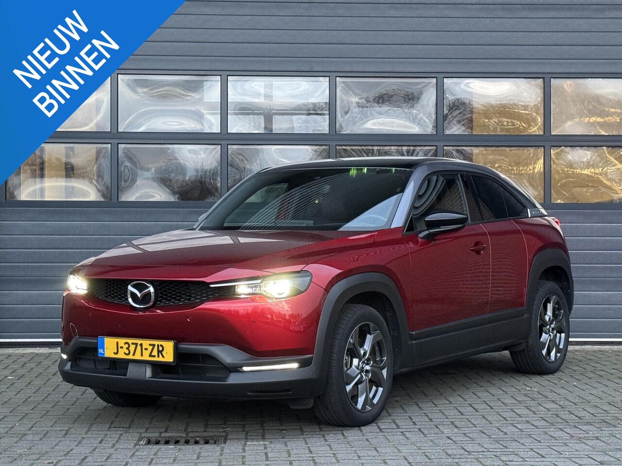 Mazda MX-30 - E-SKYACTIV 145 FIRST EDITION 36 KWH I 94% SOH I APPLE CARPLAY I P-CAMERA I CLIMATE CONTROL - AutoWereld.nl