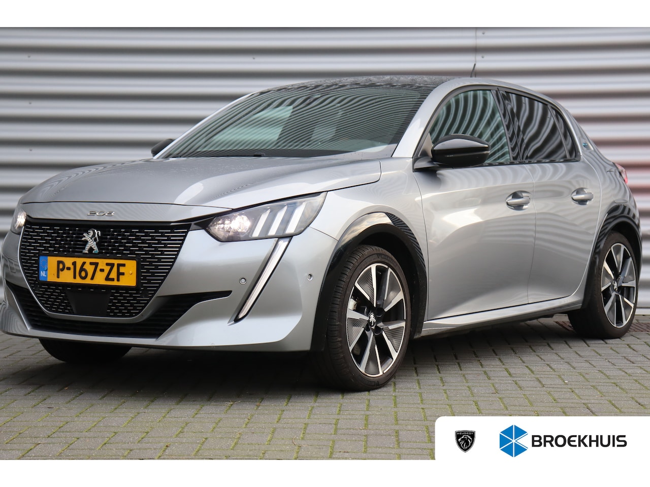 Peugeot e-208 - EV 136PK GT PACK AUTOMAAT / NAVI / LEDER / CLIMA / PDC / 17" LMV / CAMERA / PANO. DAK / AL - AutoWereld.nl
