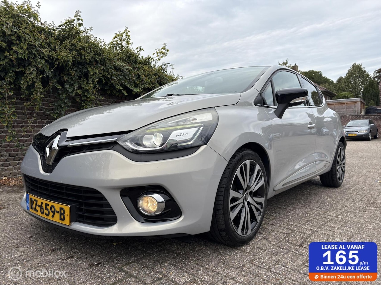 Renault Clio - 1.2 TCe Initiale Lederen bekleding / Navigatie - AutoWereld.nl