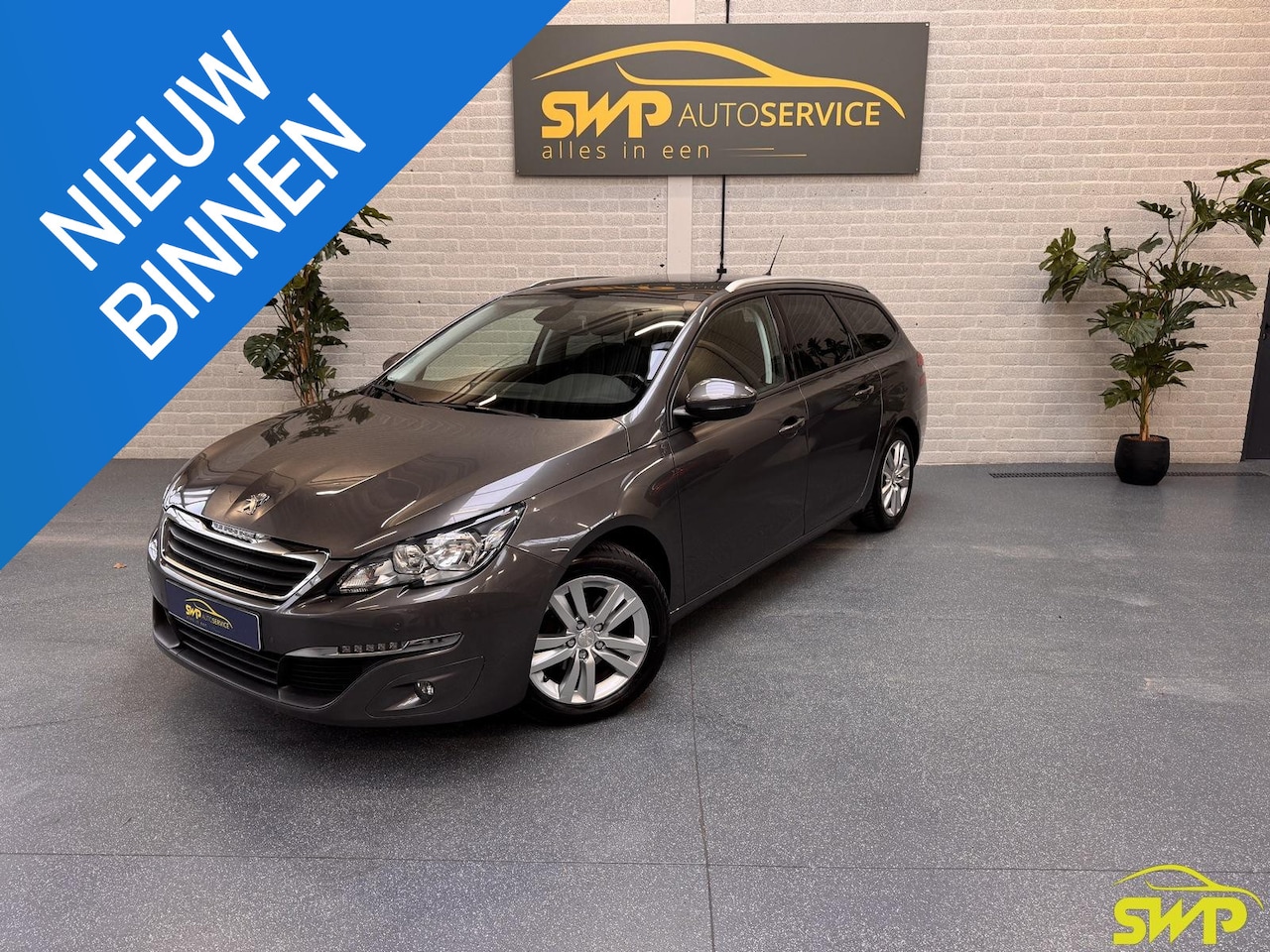 Peugeot 308 SW - 1.2 PureTech Blue Lease Executive | Navi | PDC | Pano | NAP auto! - AutoWereld.nl