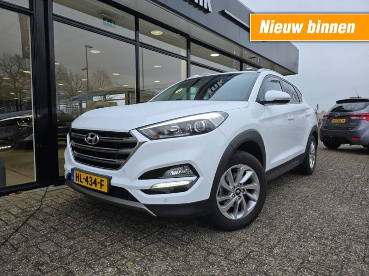 Hyundai Tucson - 1.6 GDI COMFORT NAVI/CLIMATE/TREKHAAK - AutoWereld.nl