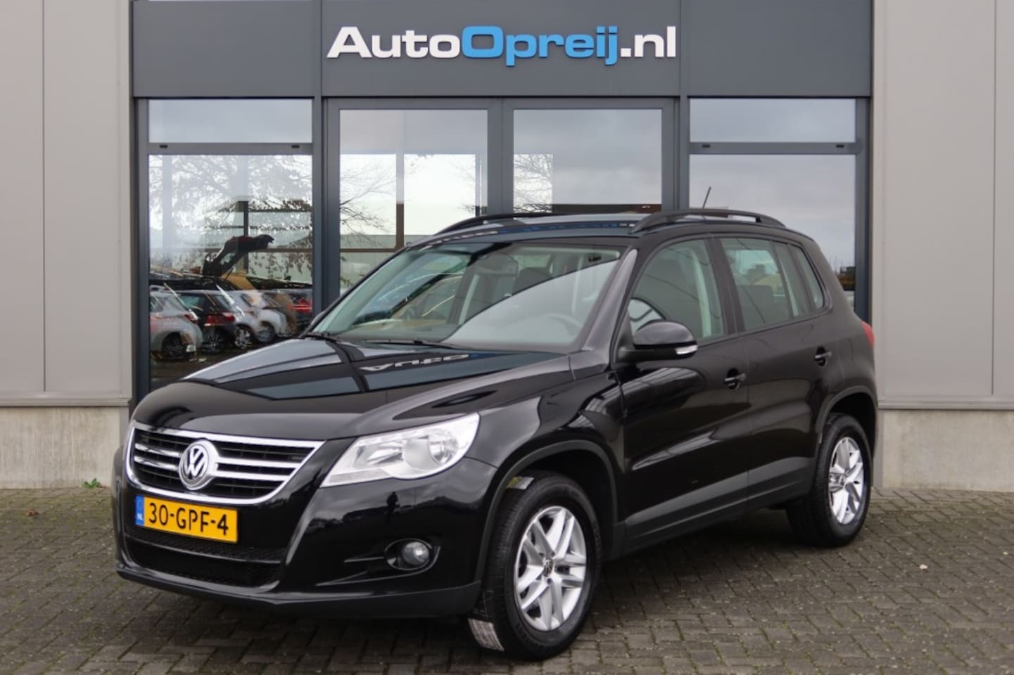 Volkswagen Tiguan - 1.4 TSI 4Motion Comfort en Design 150pk Trekhaak, 1e eigenaar, Dealer onderhouden - AutoWereld.nl
