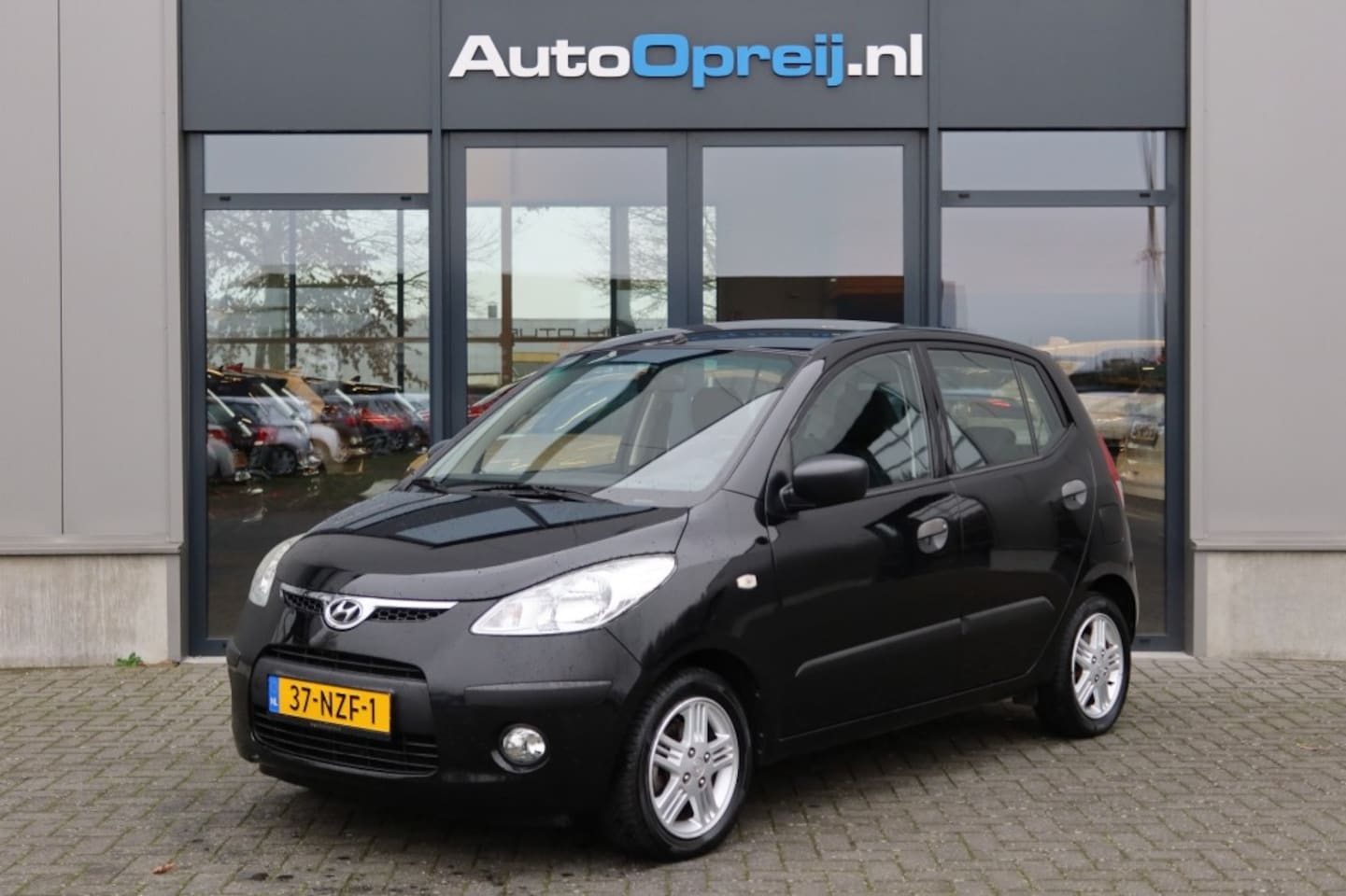 Hyundai i10 - 1.1 Active Orange Babies Airco - AutoWereld.nl