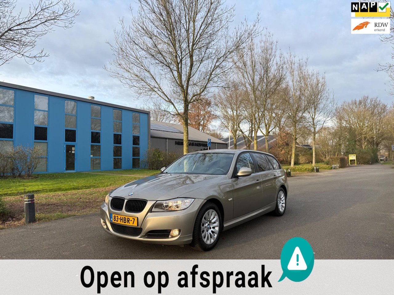 BMW 3-serie Touring - 318i Business Line NWE KETTING/JAAR APK/AUT/PDC/CRUISE/CLIMA - AutoWereld.nl
