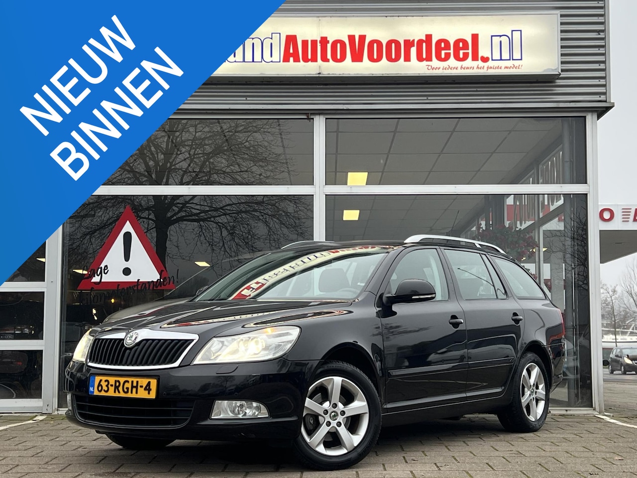 Skoda Octavia Combi - 1.2 TSI Elegance Business Line / Xenon / Navi / PDC / Trekhaak / 2011 - AutoWereld.nl