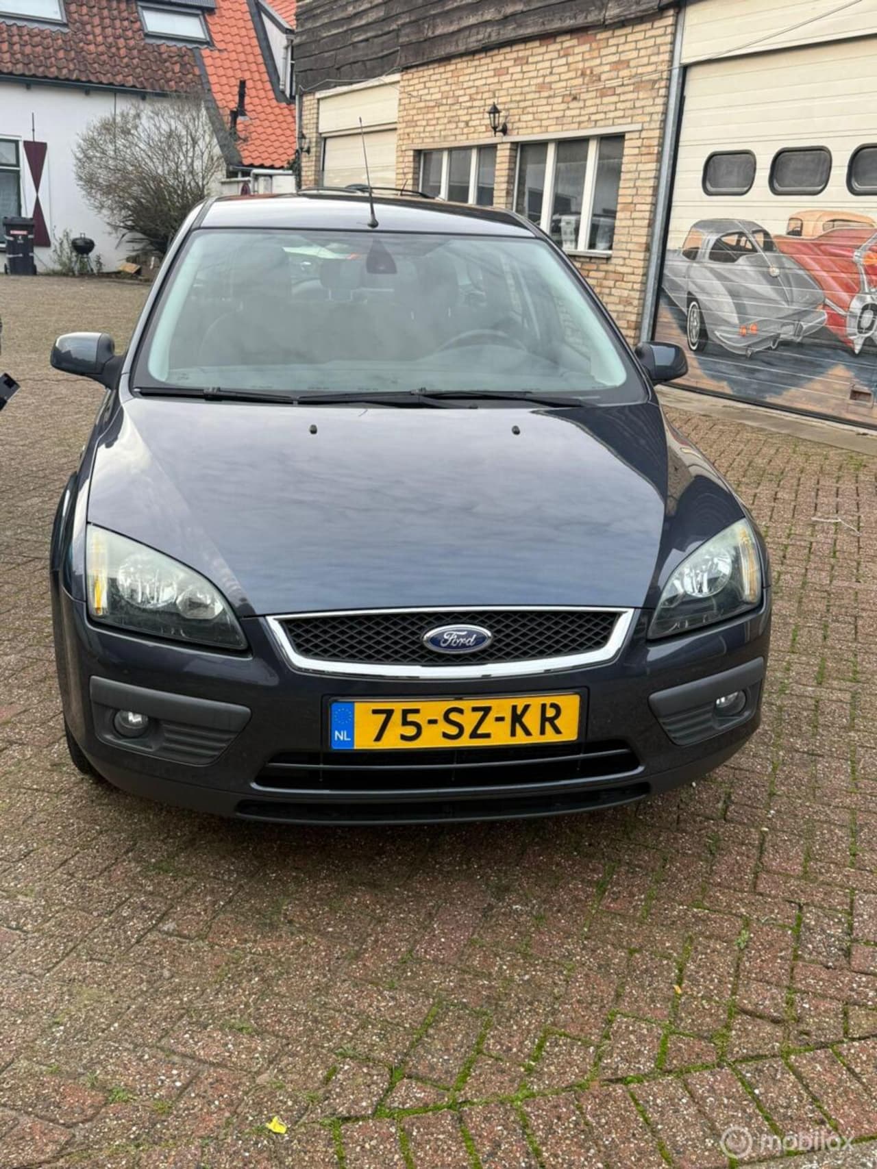 Ford Focus Wagon - 1.6-16V Ghia 1.6-16V Ghia - AutoWereld.nl