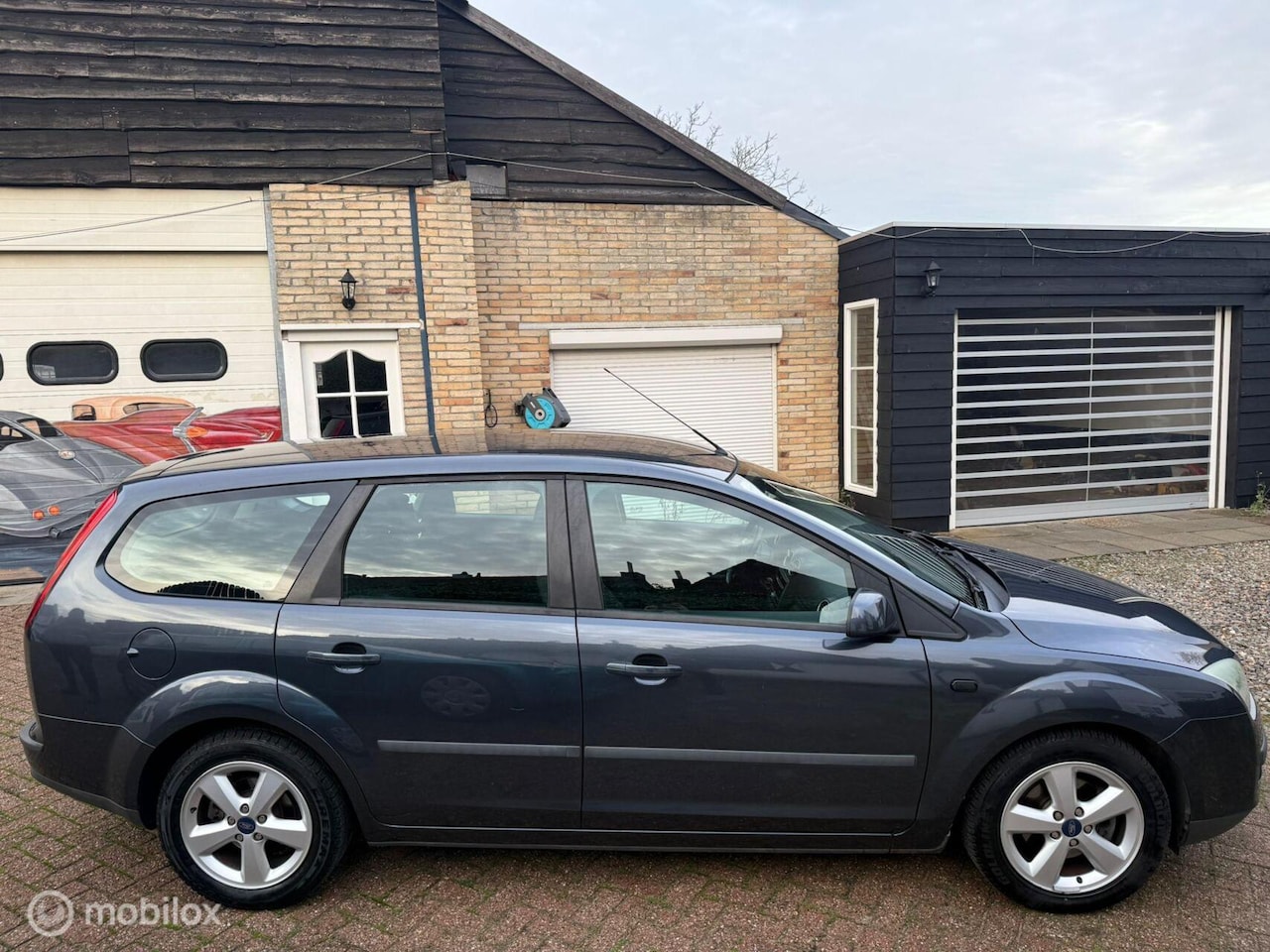 Ford Focus Wagon - 1.6-16V Ghia 1.6-16V Ghia - AutoWereld.nl