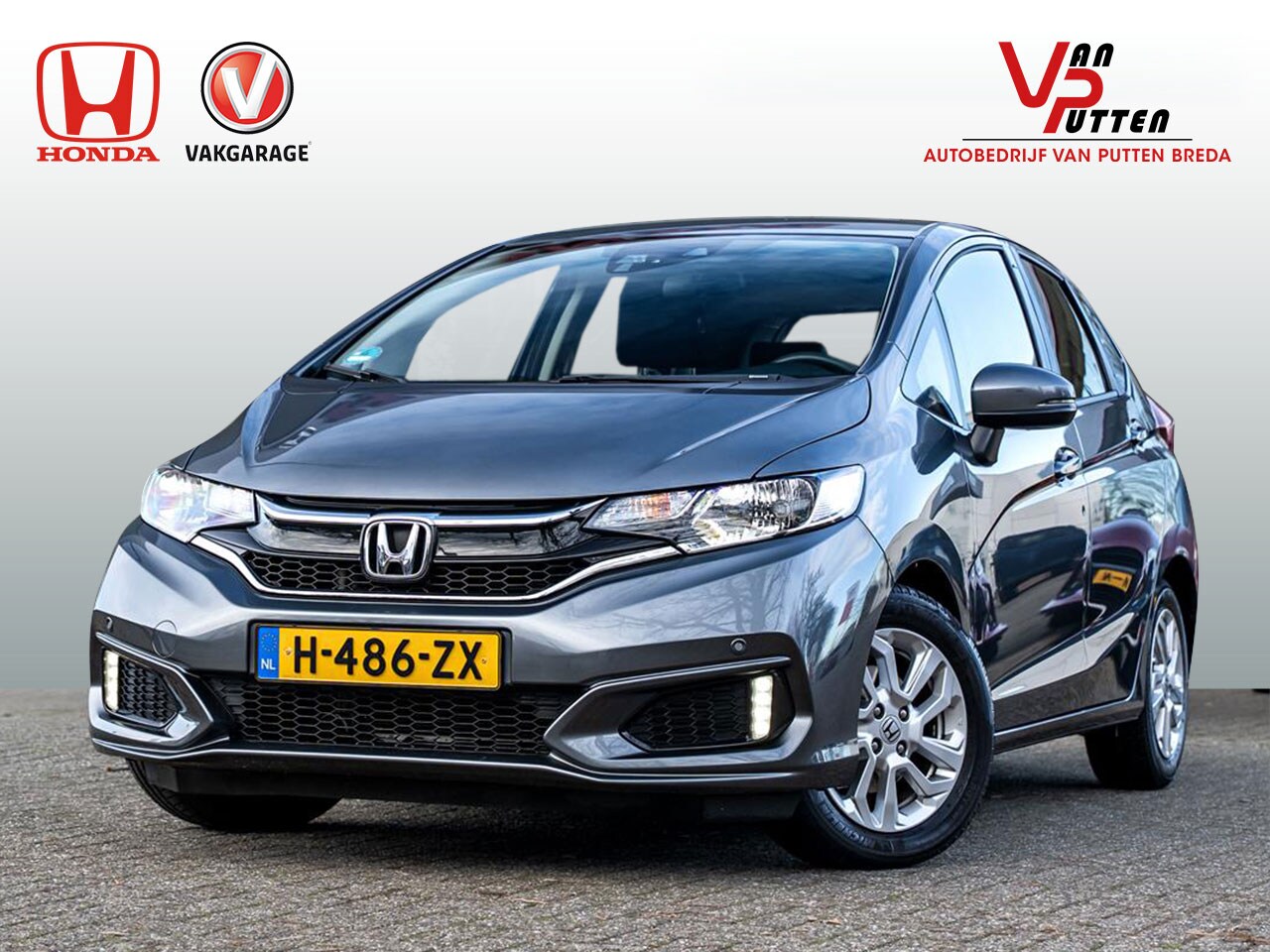 Honda Jazz - 1.4 i-VTEC Comfort Automaat | NL auto | Lage km stand!! | Airco | Cruise control | Stoelve - AutoWereld.nl