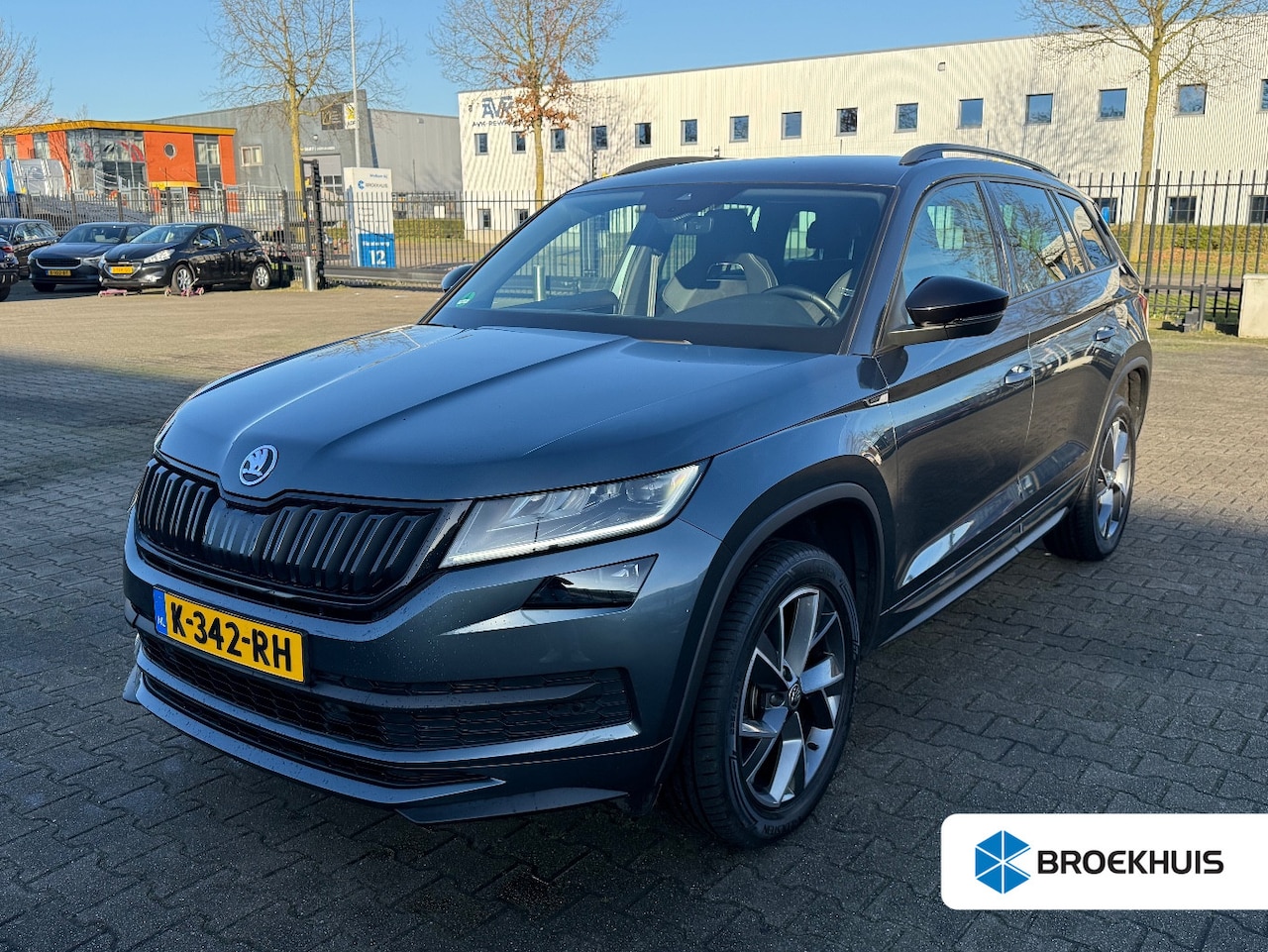 Skoda Kodiaq - 1.5 TSI 150 pk Sportline Business 7-DSG | Achteruitrijcamera | Elektrische geheugen stoel - AutoWereld.nl