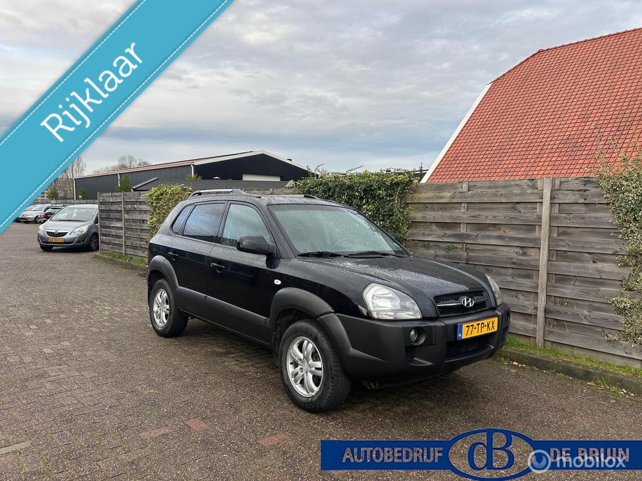Hyundai Tucson - 2.0i Style Premium leer Trekhaak - AutoWereld.nl
