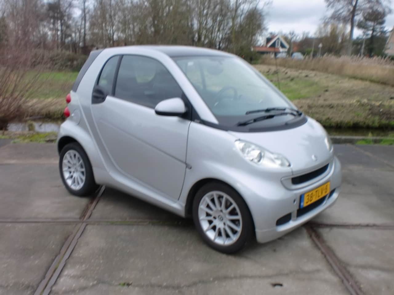 Smart Fortwo coupé - 1.0 PASSION AUT AIRCO BJ2011 GRIJS KM48 . - AutoWereld.nl