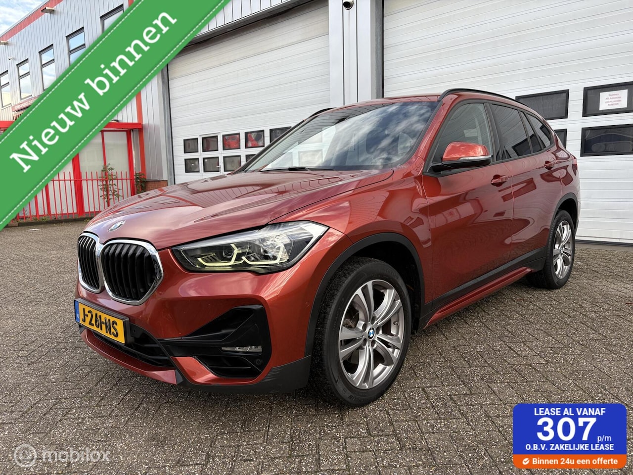 BMW X1 - sDrive18i High Executive ECC/LEDER/XENON/PDC/LMV/APK - AutoWereld.nl