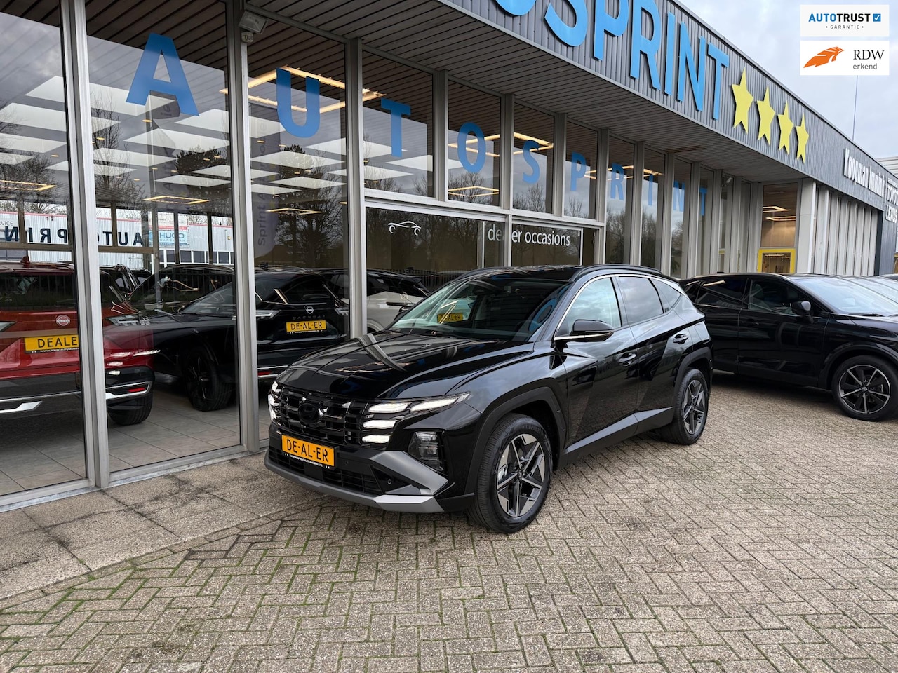 Hyundai Tucson - 1.6 T-GDI HEV Comfort 161PK / NAVIGATIE / ELEKTRISCHE ACHTERKLEP / - AutoWereld.nl