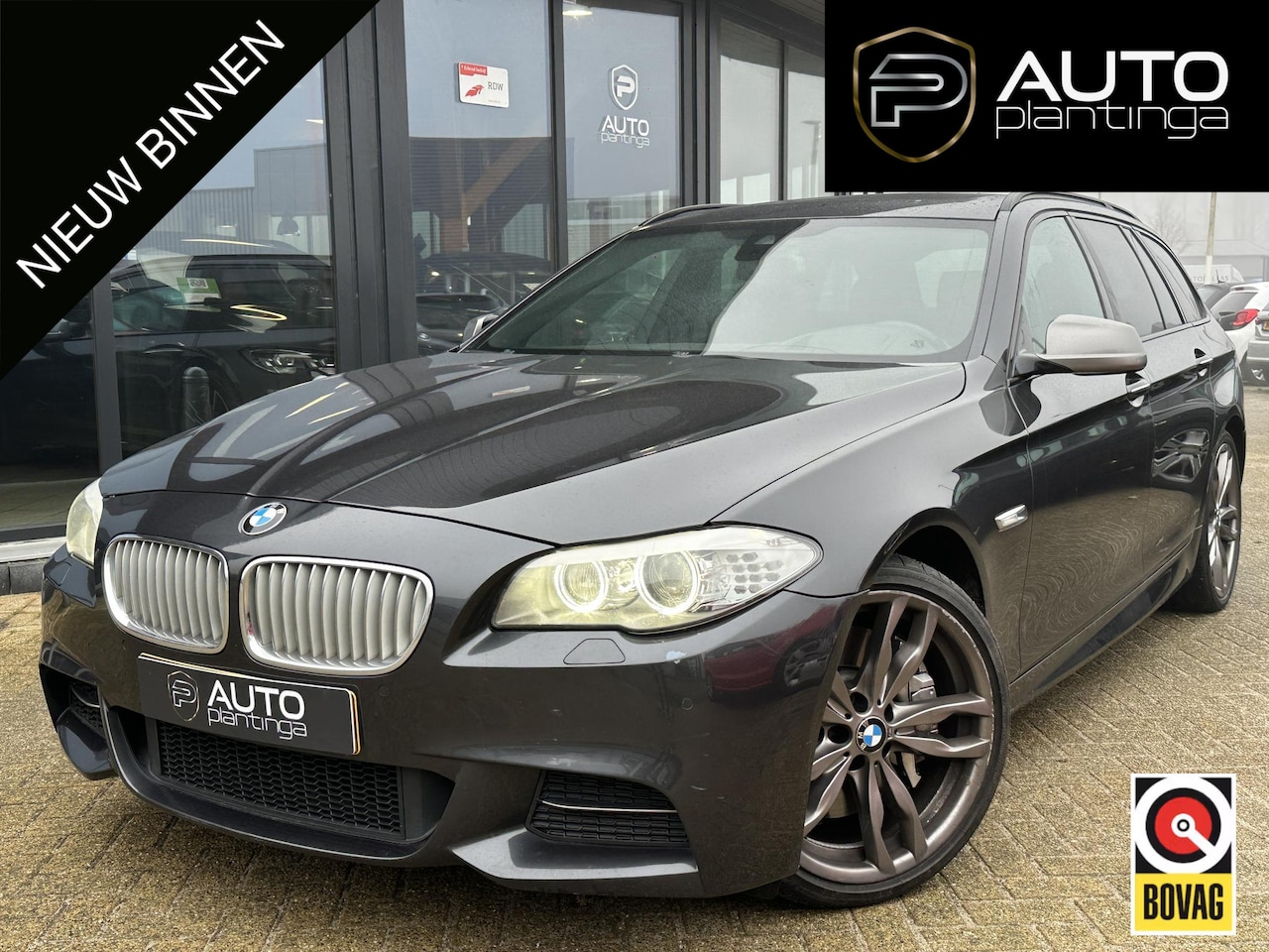 BMW 5-serie Touring - M550xd 381PK | Onderhoudshistorie | Pano | Head UP | Achteruitrijcamera | Elek Stoelen met - AutoWereld.nl