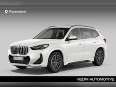 BMW X1 - xDrive23i | Trekhaak | Head up | Panoramadak | Sportstoelen | Stuurverwarming | Parking as