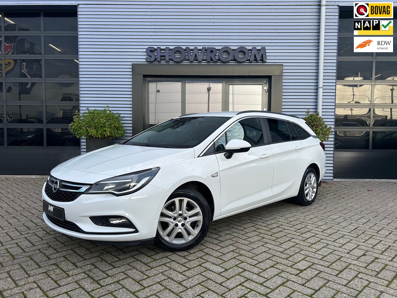 Opel Astra Sports Tourer - 1.0 Business+ Apple Carpley|Cruise|Trekhaak - AutoWereld.nl