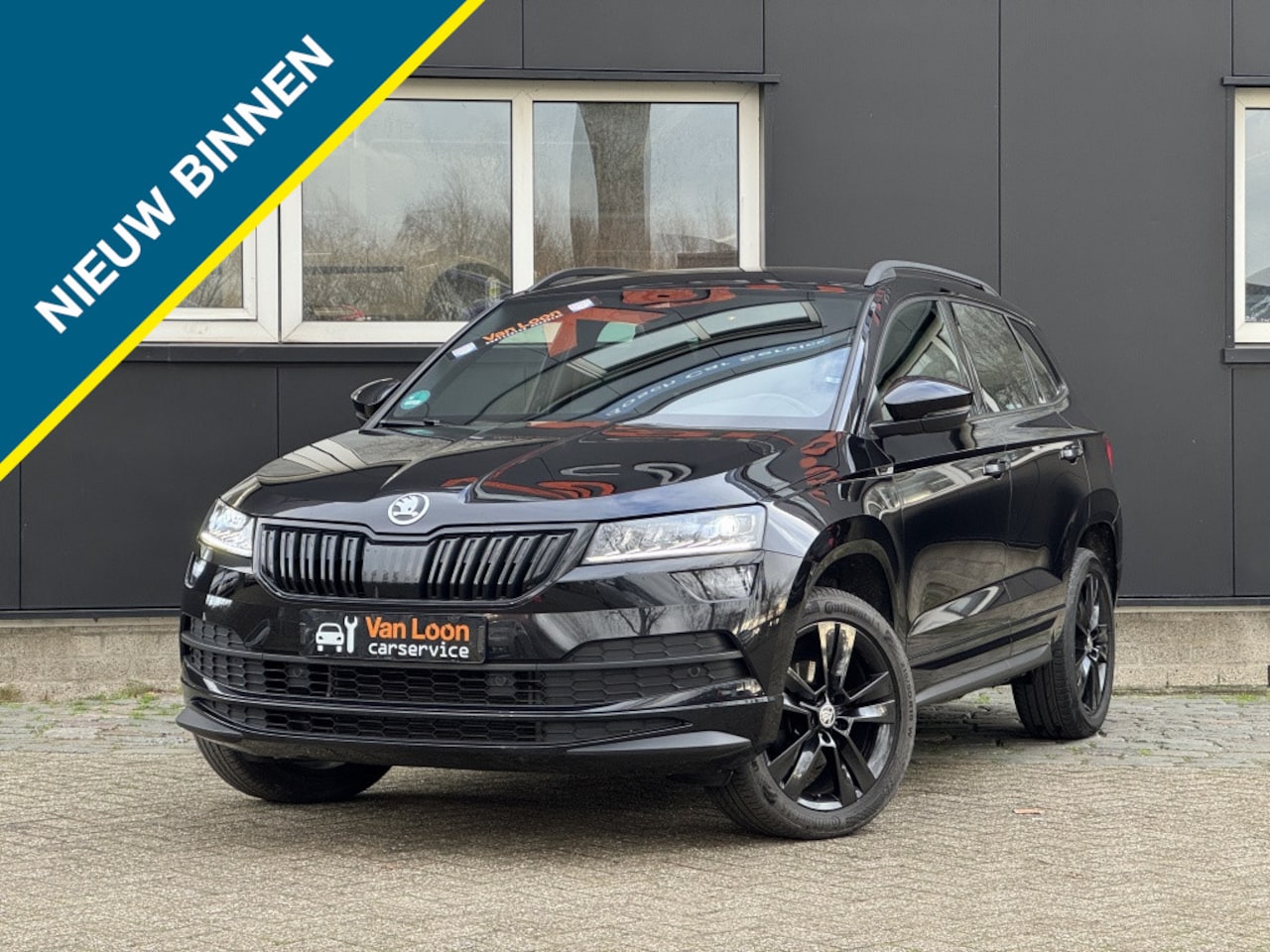 Skoda Karoq - 1.5TSI 150PK Sportline/Elek Thaak/Stoelverw + bank/Camera/Adap c - AutoWereld.nl