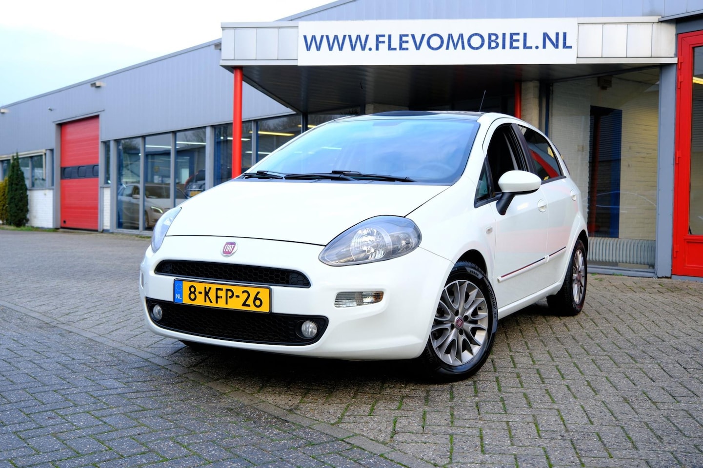 Fiat Punto Evo - 0.9 TwinAir Lounge 5-drs Pano|Clima|LMV - AutoWereld.nl