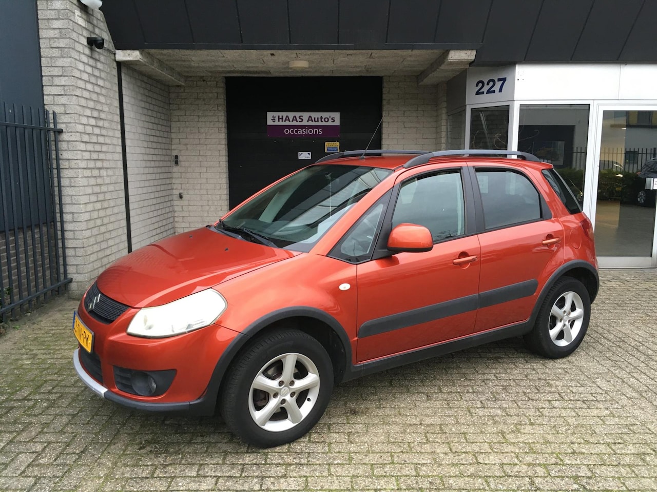Suzuki SX4 - 1.6 4Grip Exclusive / 4 WD / NL-AUTO+NAP / TREKHAAK / FRISSE AUTO / AIRCO ACC - AutoWereld.nl