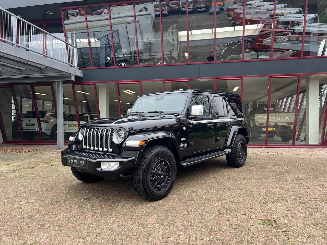 Jeep Wrangler Unlimited - 4xe 380 Sahara | Irmscher | Cross | Camera voor | - AutoWereld.nl