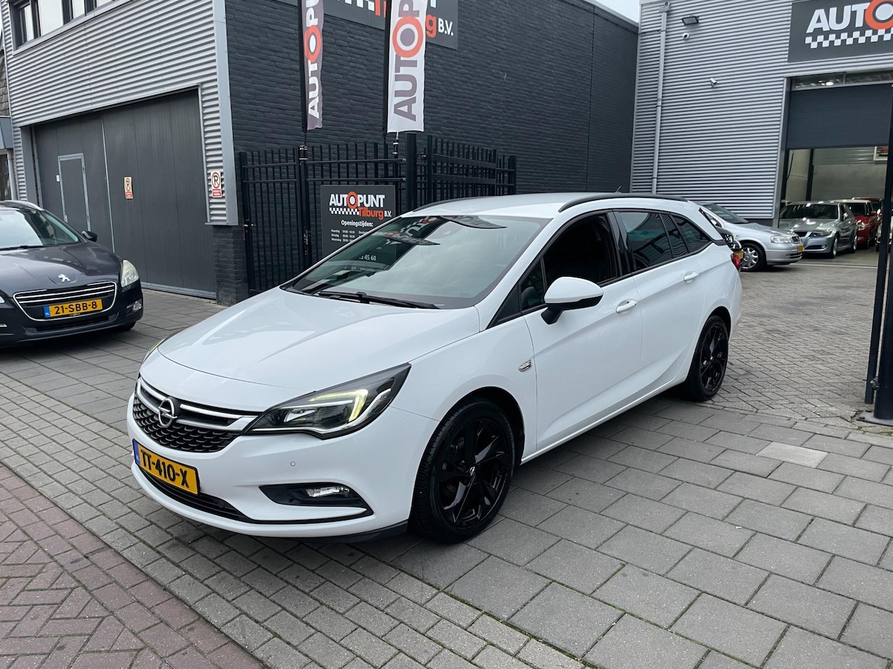 Opel Astra Sports Tourer - 1.0 Turbo Business Executive Trekhaak Airco NAP APK - AutoWereld.nl