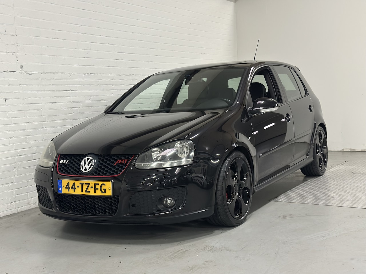 Volkswagen Golf - 2.0 TFSI GTI NAVI / CLIMA /CRUISE / LEER - AutoWereld.nl