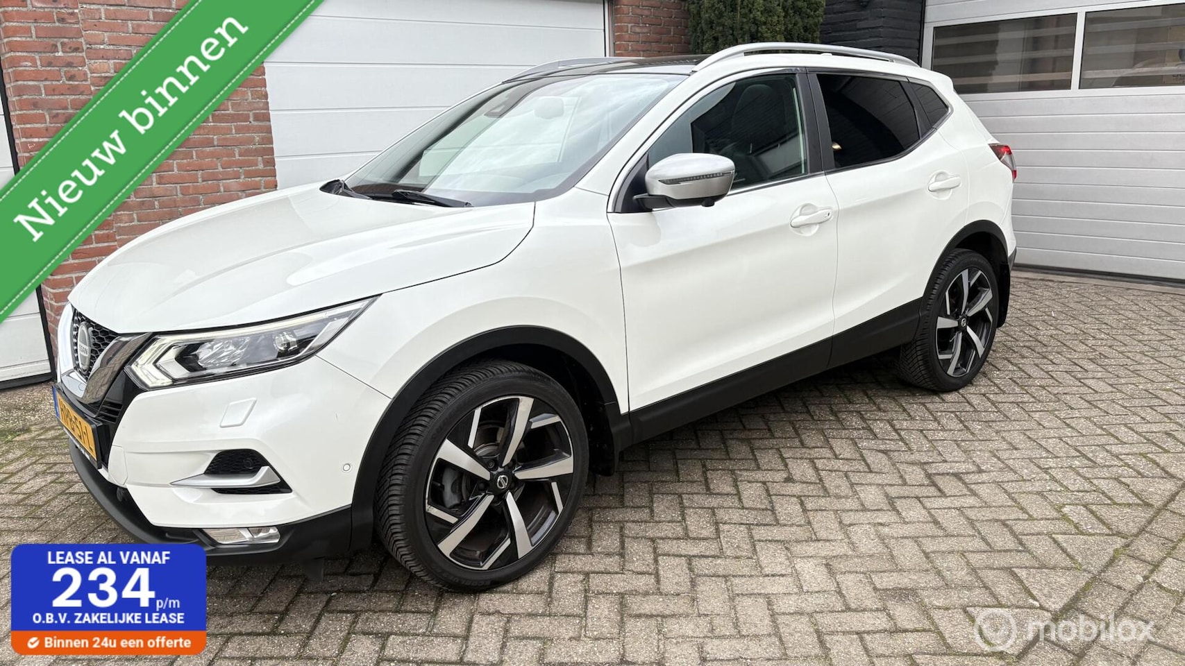 Nissan Qashqai - 1.2 Tekna + full options - AutoWereld.nl