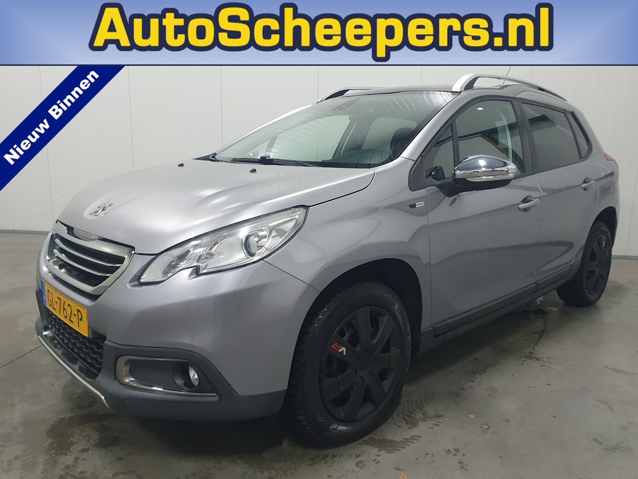 Peugeot 2008 - 1.2 PureTech Style PANO/NAVI/CLIMA/CRUISE/PDC - AutoWereld.nl