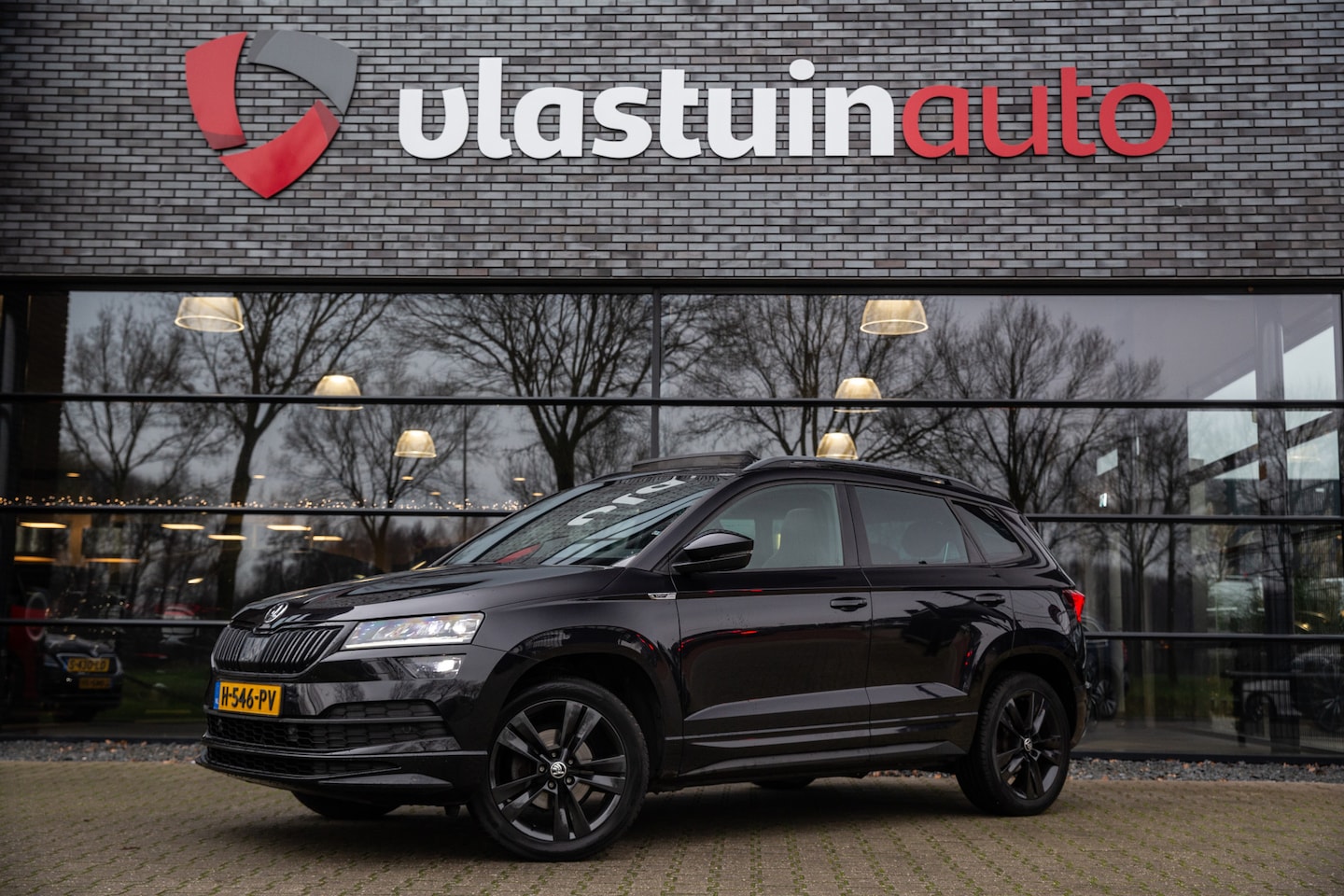 Skoda Karoq - 1.5 TSI ACT Sportline Business 1.5 TSI ACT Sportline Business , Panoramadak, - AutoWereld.nl