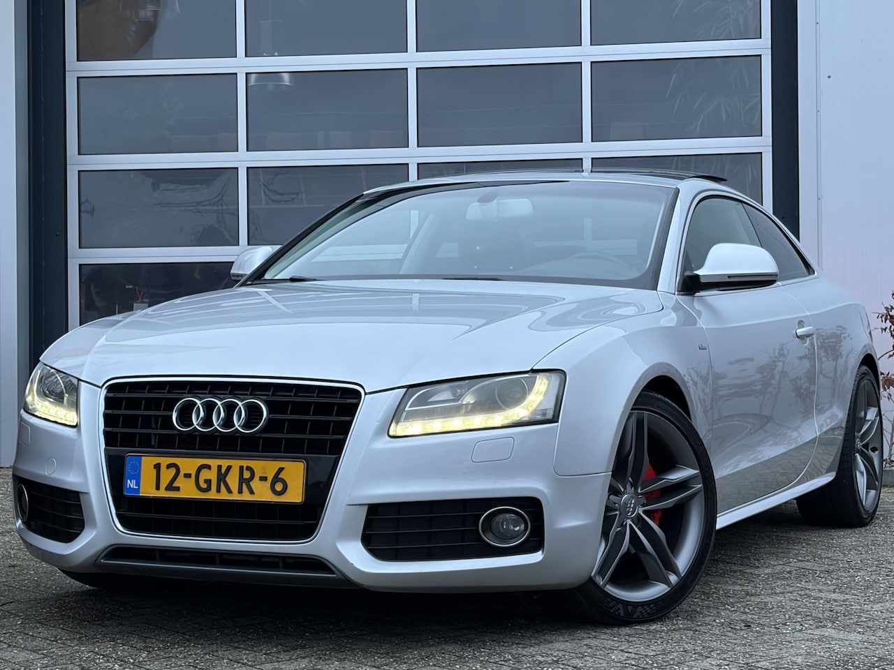 Audi A5 Coupé - 3.2 FSI Pro Line 265pk | S-line pakket | Audio-navigatie full map + cd-wisselaar | Bi-xeno - AutoWereld.nl