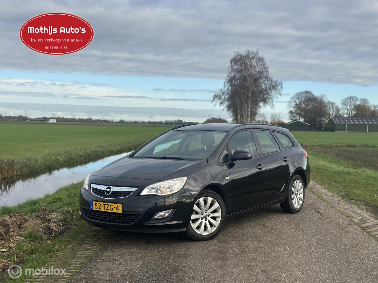 Opel Astra Sports Tourer - 1.4 Edition Navi Nieuwe APK! - AutoWereld.nl