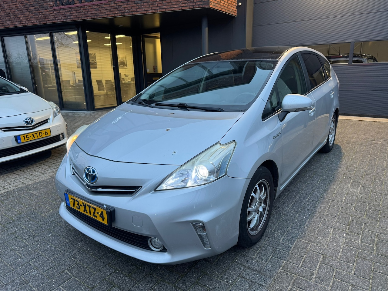 Toyota Prius Wagon - 1.8 Aspiration 7PERS XENON PANO CRUISE HEADUP ORIG NL NAP - AutoWereld.nl
