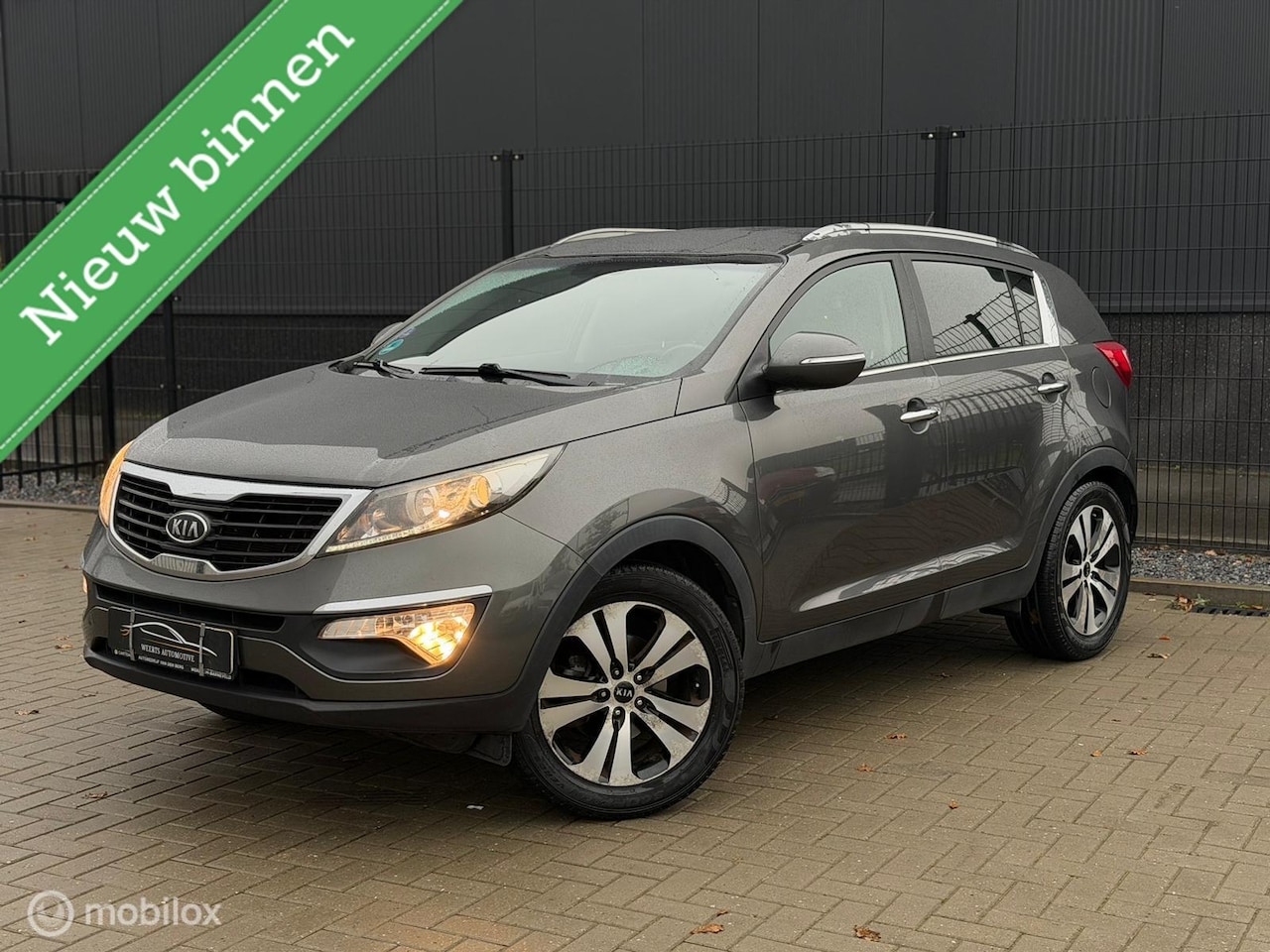 Kia Sportage - 1.6 GDI ISG X-PACK CRUISE|TREKHAAK|AIRCO|PDC - AutoWereld.nl